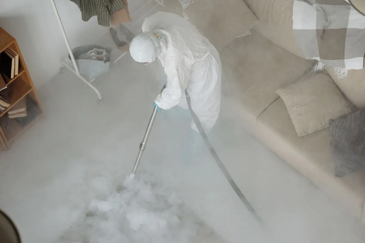 Biohazard cleanup technician in protective equipment, South Hill, WA